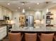 Beautiful kitchen with granite countertops, stainless steel appliances, and a large island with seating at 107 Forest Rd, Oxford, NC 27565