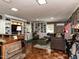Entertaining space featuring a bar, lounge area and collection displays at 107 Forest Rd, Oxford, NC 27565
