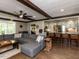 Inviting living space with a ceiling fan, hardwood floors, and an open layout to the kitchen at 107 Forest Rd, Oxford, NC 27565