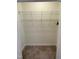A walk-in closet with shelving and neutral carpet provides ample storage space at 113 Conner Dr # 103, Chapel Hill, NC 27514