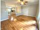 Bright, open living room featuring hardwood floors and a view to the kitchen at 113 Conner Dr # 103, Chapel Hill, NC 27514