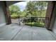 The balcony provides scenic views and enhances the outdoor living experience of the home at 113 Conner Dv # 106, Chapel Hill, NC 27514