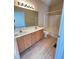 Bathroom featuring double sinks, a large mirror, and a shower-tub combination at 113 Conner Dv # 106, Chapel Hill, NC 27514