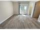 Bright bedroom with access to a balcony through French doors and featuring a neutral color palette at 113 Conner Dv # 106, Chapel Hill, NC 27514
