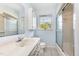 Cozy bathroom featuring a single vanity, neutral tones, and a shower-tub combination at 1303 Cherry Dr, Burlington, NC 27215
