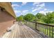 The deck showcases wooden flooring and railings, offering a relaxing outdoor space at 1303 Cherry Dr, Burlington, NC 27215