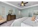 Serene bedroom with calming colors, a stylish dresser, and a comfortable armchair at 137 Cultivator Ct, Angier, NC 27501