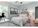 Charming bedroom featuring a comfortable bed, stylish decor, and soft, natural light at 137 Cultivator Ct, Angier, NC 27501