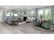 Open living room with a fireplace, ample seating, and plenty of natural light at 137 Cultivator Ct, Angier, NC 27501
