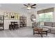 Inviting living room featuring comfortable seating, a large window, and stylish decorative accents at 137 Cultivator Ct, Angier, NC 27501