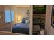 Comfortable bedroom with mirrored closet and blue accents, providing ample storage at 1605 Sagamore Dr, Louisburg, NC 27549