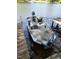 Docked Timemaker boat featuring grey carpet and chairs for a relaxing lake experience at 1605 Sagamore Dr, Louisburg, NC 27549