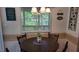 Cozy dining area with natural light and view of the outdoors at 1605 Sagamore Dr, Louisburg, NC 27549
