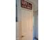 This door has four panels and gold hardware at 1605 Sagamore Dr, Louisburg, NC 27549