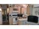 Functional kitchen with white appliances and charming decor at 1605 Sagamore Dr, Louisburg, NC 27549