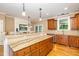 Kitchen with stainless appliances, granite countertops and an extended breakfast bar at 1619 Carriage Dr, Franklinton, NC 27525
