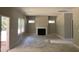 View of the living room features a fireplace and two windows at 169 Pecan Valley Way, Four Oaks, NC 27524