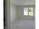 New bedroom with a large window that offers a view of the surrounding neighborhood at 183 Pecan Valley Way, Four Oaks, NC 27524