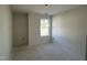 New bedroom with a large window that offers a view of the surrounding neighborhood at 183 Pecan Valley Way, Four Oaks, NC 27524