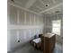 Bedroom, with large window, ready to be transformed into a personalized space at 183 Pecan Valley Way, Four Oaks, NC 27524