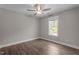 Serene bedroom with wood flooring and natural light from the window creating a calming atmosphere at 1914 Jack Rd, Clayton, NC 27520