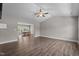 Spacious living room with hardwood floors, high ceilings and a view to the dining area at 1914 Jack Rd, Clayton, NC 27520