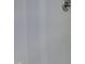 A close up shot of a white fiberglass shower stall with chrome fixtures at 202 November St, Garner, NC 27529