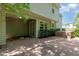 Rear exterior view of a house, featuring a patio with a hot tub at 203 Downing Bluff Dr, Morrisville, NC 27560