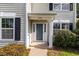 Close up of front door and entry of charming two-story home at 203 Downing Bluff Dr, Morrisville, NC 27560