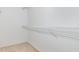 Bright walk-in closet with wall-mounted wire shelving for maximum storage and organization at 203 Downing Bluff Dr, Morrisville, NC 27560