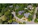 Aerial view of a neighborhood with well-maintained homes surrounded by lush greenery at 205 Buncombe St, Raleigh, NC 27609