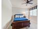 Comfortable bedroom with a wooden bed frame and crisp white trim at 205 Buncombe St, Raleigh, NC 27609