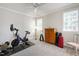 Well-lit exercise room complete with stationary bike and workout equipment at 205 Buncombe St, Raleigh, NC 27609