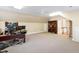 Office or flex space with neutral carpet and built-in storage, including a bookshelf at 205 Buncombe St, Raleigh, NC 27609