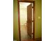 Bright bathroom featuring toilet, shower, wood floors, and vanity at 2315 George Anderson Dr, Hillsborough, NC 27278