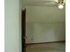 Angled bedroom features a ceiling fan, carpet, and attic access at 2315 George Anderson Dr, Hillsborough, NC 27278
