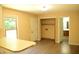 Eat-in kitchen featuring vinyl flooring, an adjacent door, and access to other rooms at 2315 George Anderson Dr, Hillsborough, NC 27278