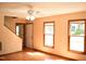 Spacious living room with wood floors, natural light, and ceiling fan at 2315 George Anderson Dr, Hillsborough, NC 27278