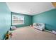 Bedroom featuring neutral carpet, a window, and a whimsical color scheme at 2415 Ivy Knoll Dr, Mebane, NC 27302
