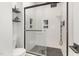 Modern bathroom with black frame glass shower, and white subway tile at 2540 Beech Gap Ct, Raleigh, NC 27603