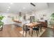 Inviting living space flowing into the kitchen with natural light, modern decor, and open layout at 2540 Beech Gap Ct, Raleigh, NC 27603