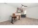 Spacious office with a sit/stand desk, comfortable chair and built-in bookshelves at 2540 Beech Gap Ct, Raleigh, NC 27603