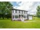 Attractive two-story home with an attached garage, well-manicured lawn, and classic black shutter accents at 3004 Red Cir, Willow Springs, NC 27592