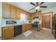 Functional kitchen featuring wood cabinets, stainless steel appliances, and a clean, well-organized layout at 3004 Red Cir, Willow Springs, NC 27592