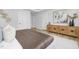 Bright main bedroom featuring a spacious layout, a comfortable bed, and stylish decor at 3018 White Rail Dr, Fuquay Varina, NC 27526