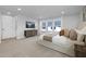 This bright main bedroom features a view of the outdoors and a rustic wood entertainment center at 3018 White Rail Dr, Fuquay Varina, NC 27526