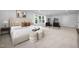 Spacious bedroom boasts natural light, neutral colors, and a cozy seating area, ideal for relaxation at 3018 White Rail Dr, Fuquay Varina, NC 27526