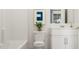 Modern bathroom with bathtub, plant and vanity at 334 Carolina Springs Blvd, Apex, NC 27539