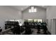 Community fitness center featuring cardio machines, free weights and a spacious area at 334 Carolina Springs Blvd, Apex, NC 27539