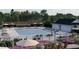 Resort style pool with sundeck, lounge chairs and lush landscaping at 334 Carolina Springs Blvd, Apex, NC 27539